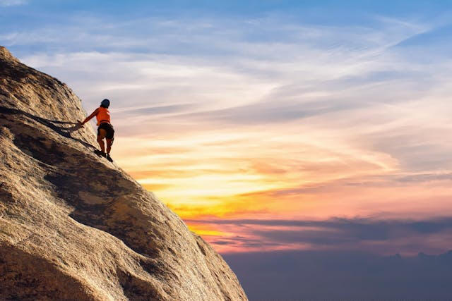 Utah County search engine optimization represented by a person climbing a mountain