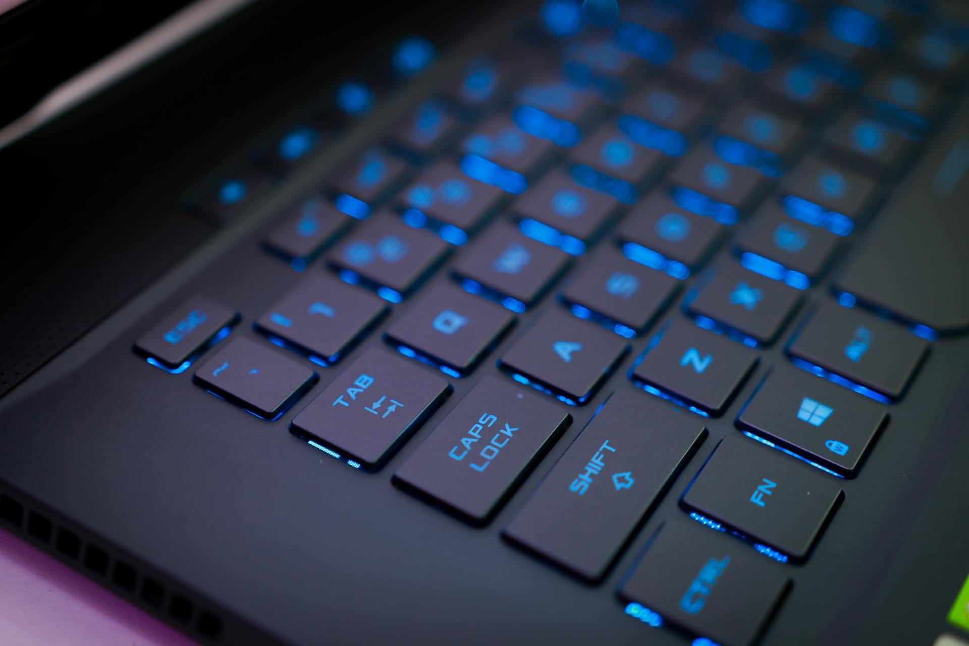 Backlit keyboard representing custom web design services for Utah businesses